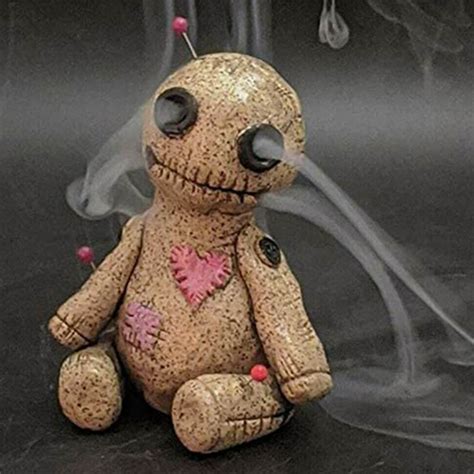 Voodoo charm incense doll